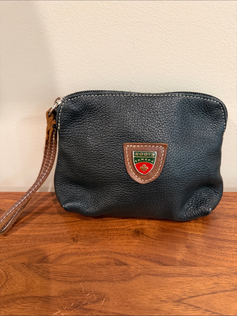 Roots Black Leather Wrist Pouch with Brown Strap